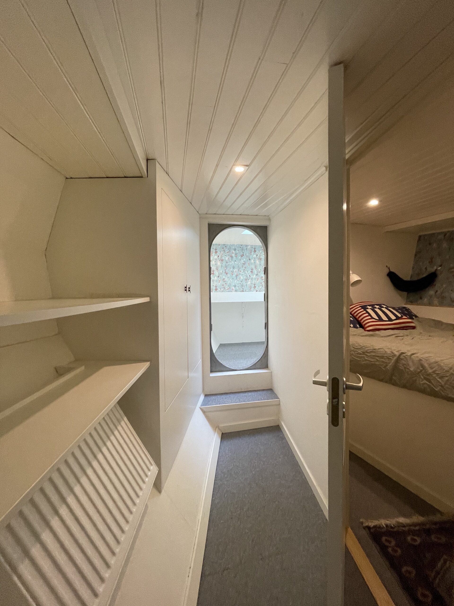 Below deck Port sides passage outside guest cabin